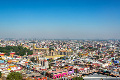 High angle view of cityscape against clear sky