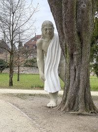 Statue of man in park