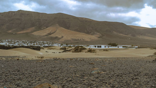 Scenic view of landscape and mountains against sky