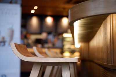 Close-up of empty chairs and table in restaurant