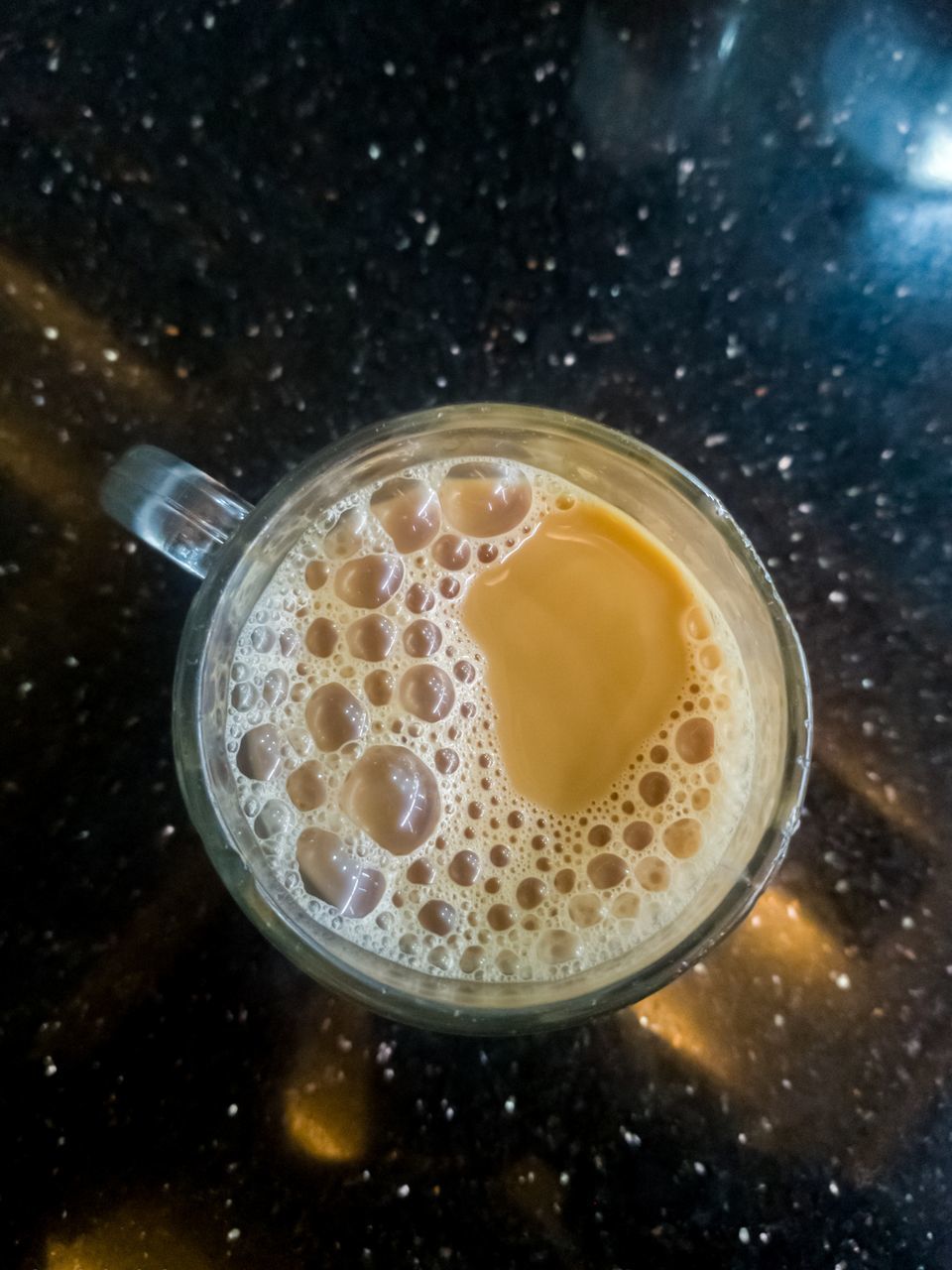 CLOSE-UP OF COFFEE ON TABLE