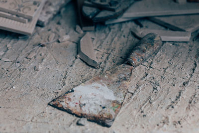 High angle view of weathered wood on floor