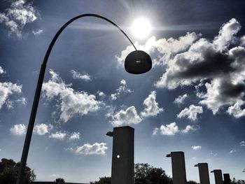 Low angle view of street light against sky