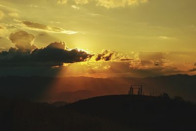Scenic view of dramatic sky during sunset
