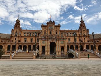 View of historical building against cloudy sky  plaza de espana 