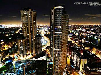 Illuminated cityscape at night