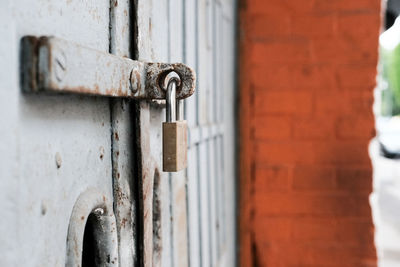 Close-up of padlock on door