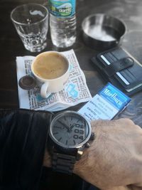 High angle view of coffee cup on table