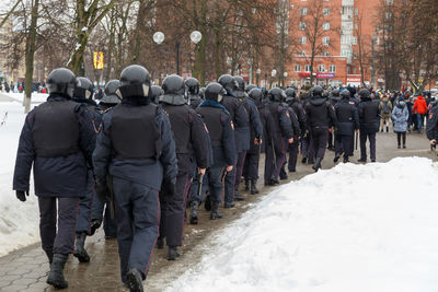 Public meeting in support of navalny, police officers going to arrest the protesters.