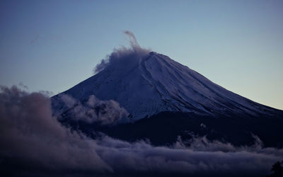 Low angle view of mountain against clear sky