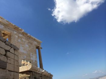 Low angle view of built structure against blue sky