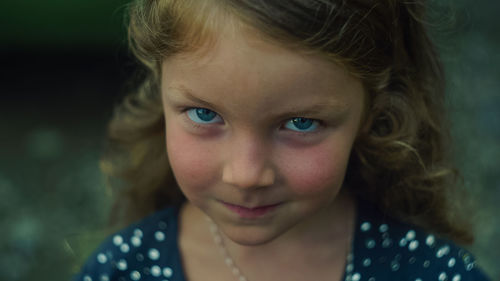 Close-up portrait of smiling girl