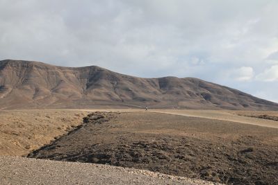 Scenic view of desert against sky