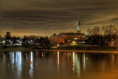 Reflection of illuminated buildings in water