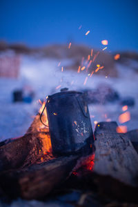 Close-up of fire on log