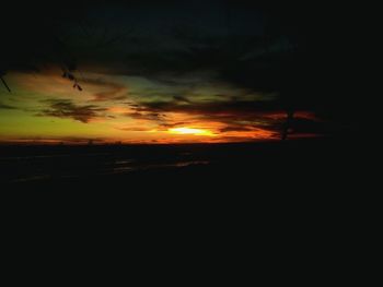 Scenic view of dramatic sky during sunset