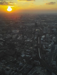 Aerial view of cityscape at sunset