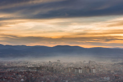 High angle view of townscape against sky during sunset