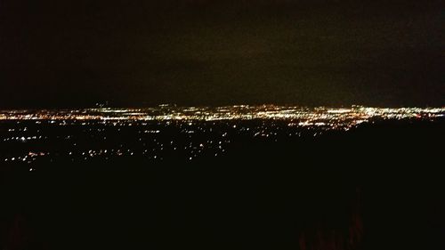 Aerial view of illuminated cityscape