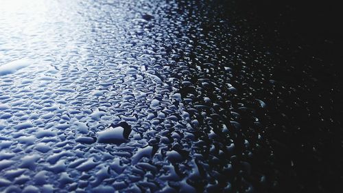 Full frame shot of wet pebbles