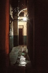 Illuminated corridor of building