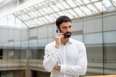 Young man using mobile phone