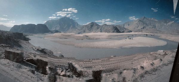 Panoramic view of desert against sky during winter
