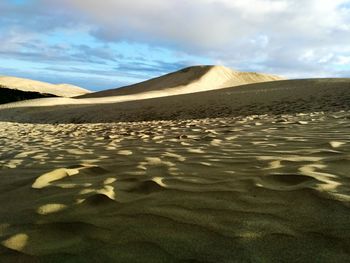 Scenic view of desert against sky