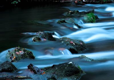 Close-up of water flowing over rocks