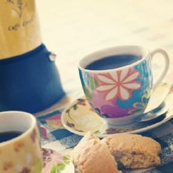 Close-up of coffee cup on table