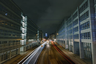 High angle view of street in city at railroad station