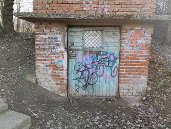 Graffiti on wall of old building