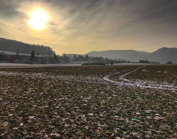 Scenic view of mountains against sky during sunset