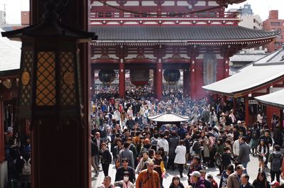 People traveling at asakusa kannon temple