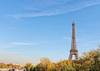 View of eiffel tower against blue sky