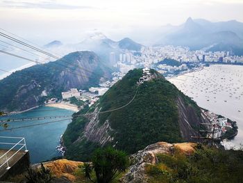 High angle view of cityscape against mountains