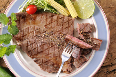 Close-up of food served in plate on table