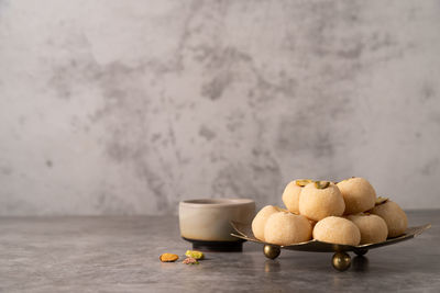 Traditional indian sweets burfi on concrete background