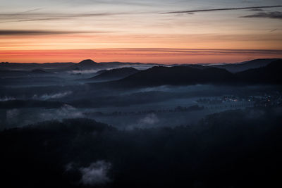 Scenic view of mountains against sky during sunset