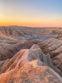 Scenic view of mountains against sky during sunrise 