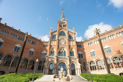 Low angle view of historic building against sky