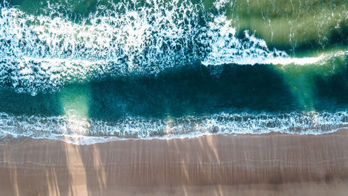 Close-up of crystal ball in sea