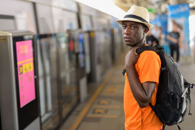 Side view of young man looking away