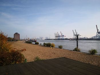 Pier at harbor against sky