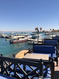 Scenic view of sea against clear blue sky