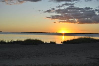 Scenic view of sea against sky during sunset