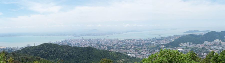 Panoramic view of cityscape against sky