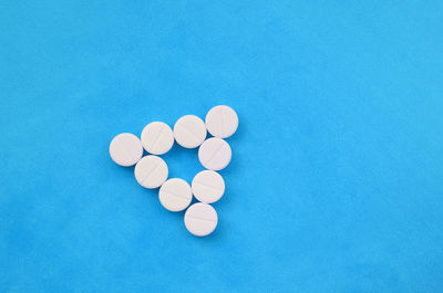 High angle view of blue paper on table