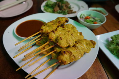 High angle view of serving food in plate on table