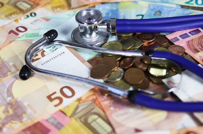 Close-up of coins on table